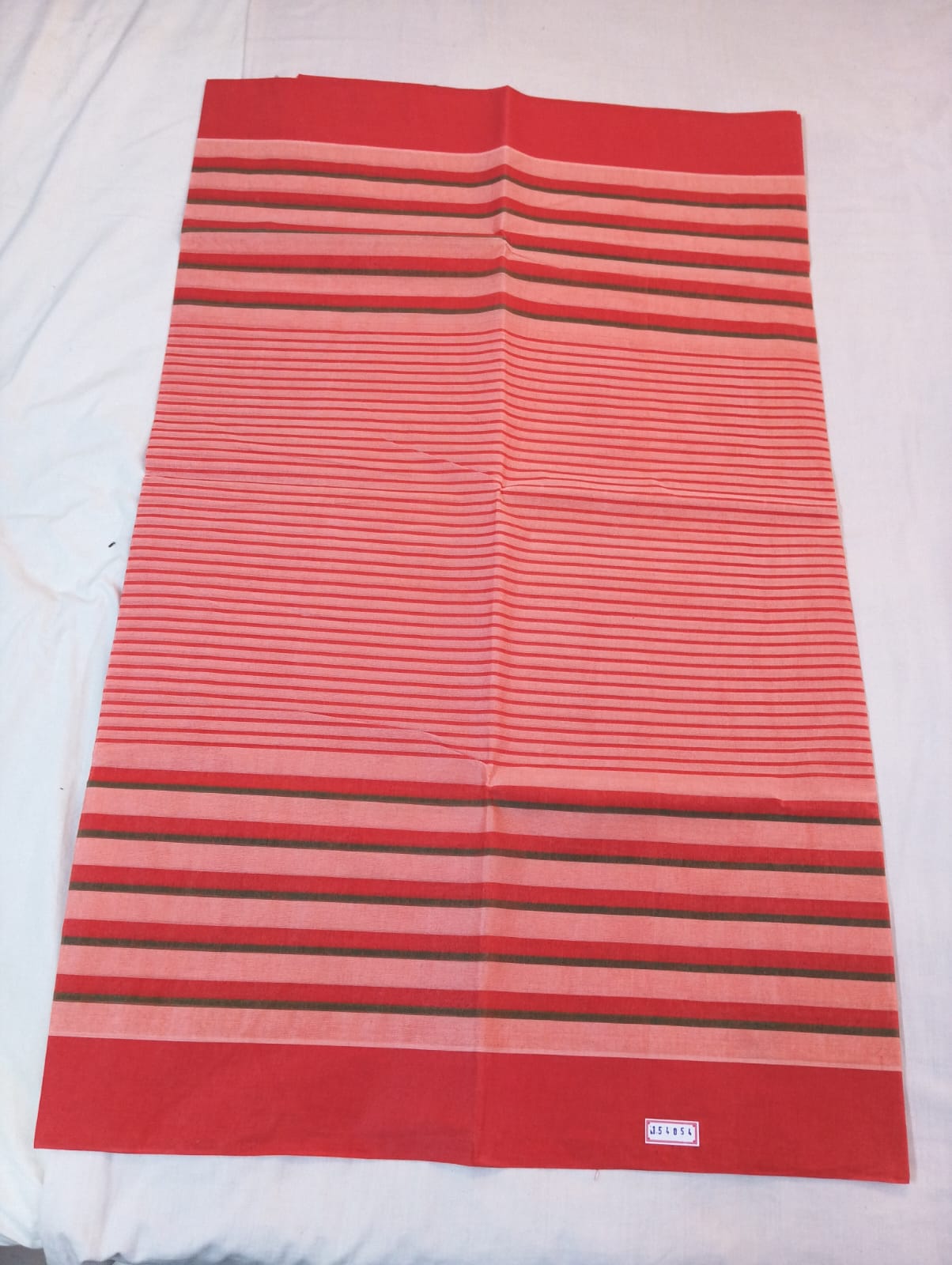 Elegant Light Pink Pinstriped Saree with Contrasting Red Border