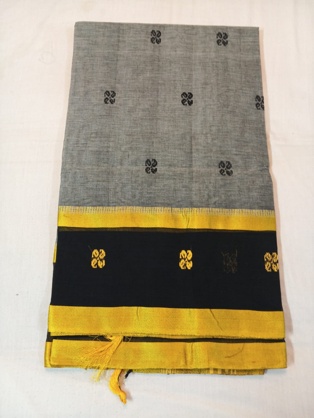 Grey Handloom Buti Saree with Golden Strip and Black Border with Golden Buti