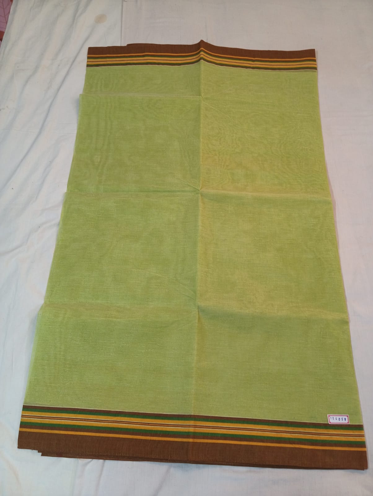 Pista Green Saree with Brown Stripe Border
