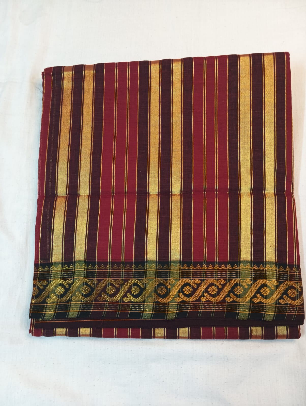 Reddish Maroon Saree with Golden Border & Golden Striped Anchal