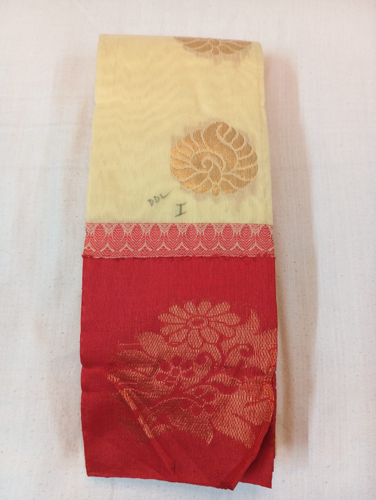 Cream Handloom Saree with Golden Buti and Red Border