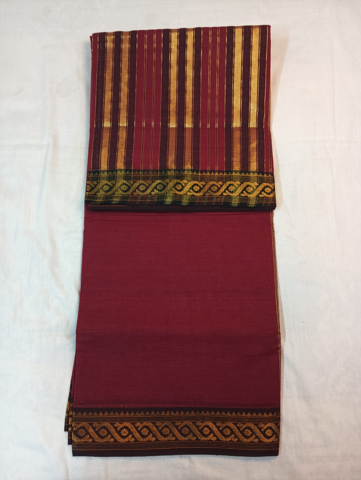 Reddish Maroon Saree with Golden Border & Golden Striped Anchal