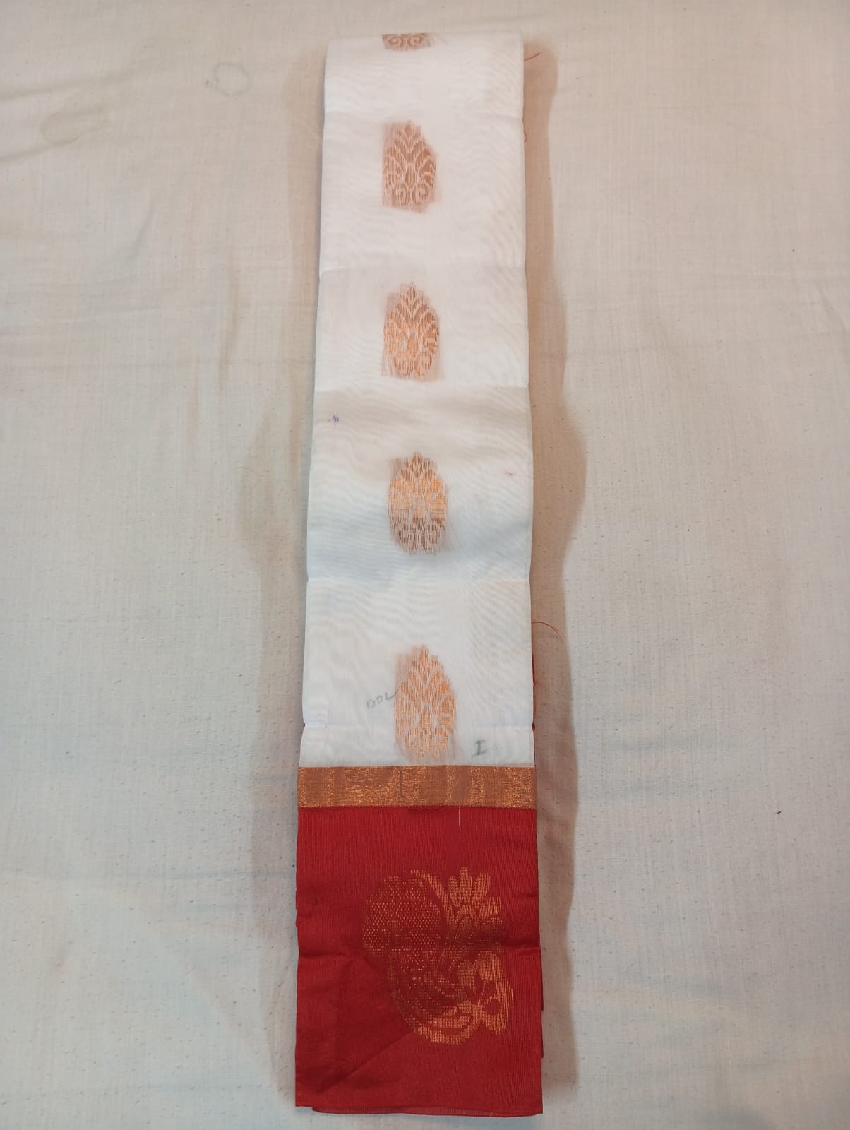 White Handloom Saree with Golden Buti and Red Border
