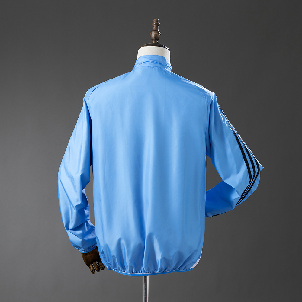 Chaqueta Real Madrid 2025/26 beige-azul