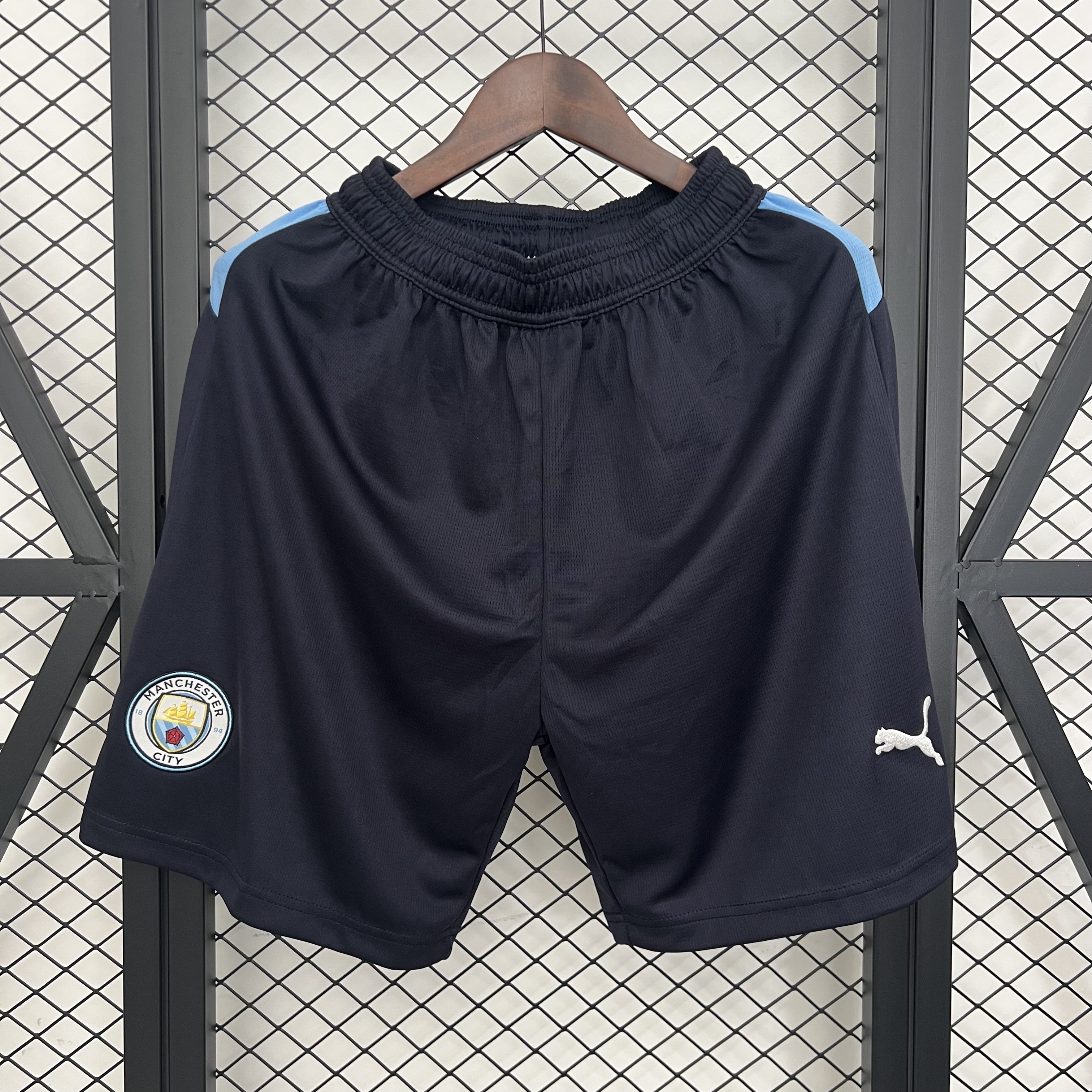 Pantalones cortos oscuros Manchester City 25/26