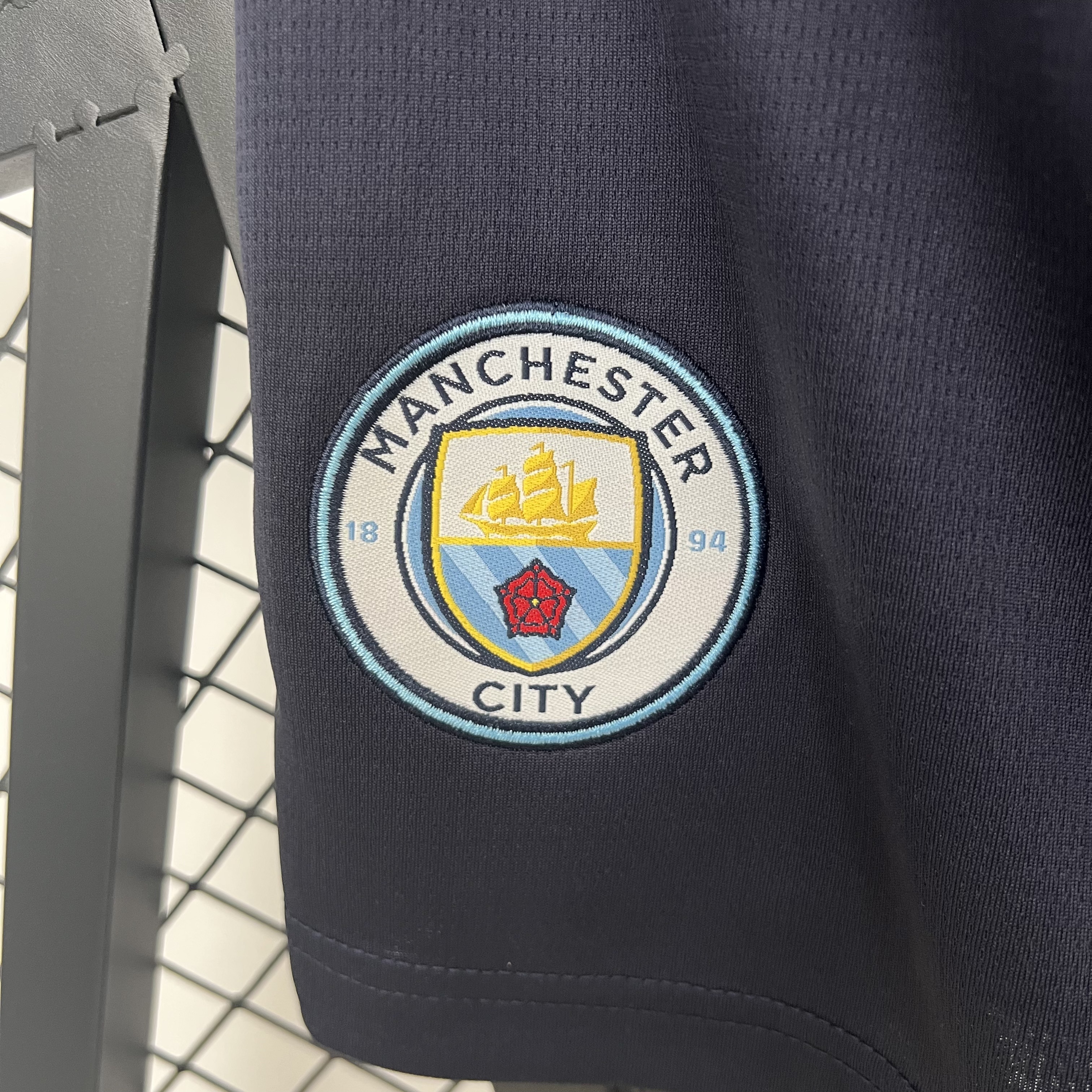 Pantalones cortos oscuros Manchester City 25/26
