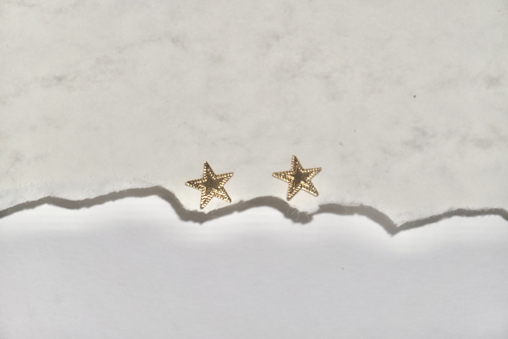 Aretes mini estrella 