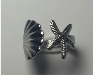 Anillo concha y estrella plateado