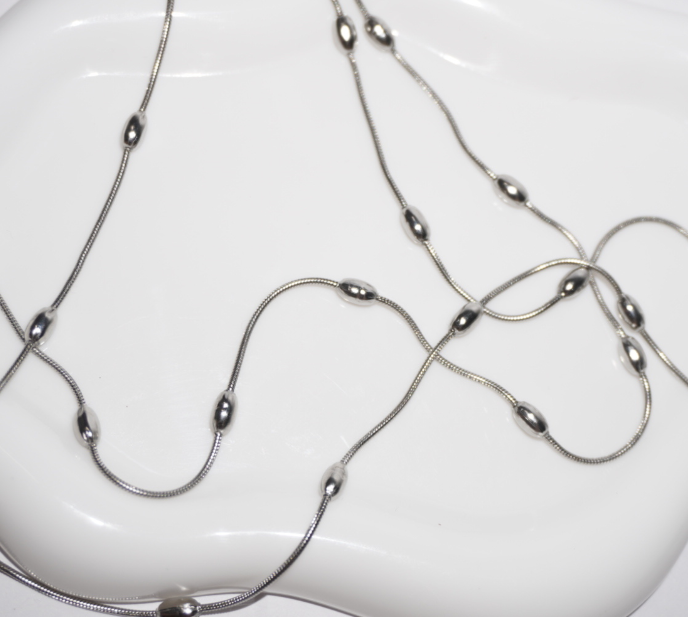 Collar doble con esferas plateadas