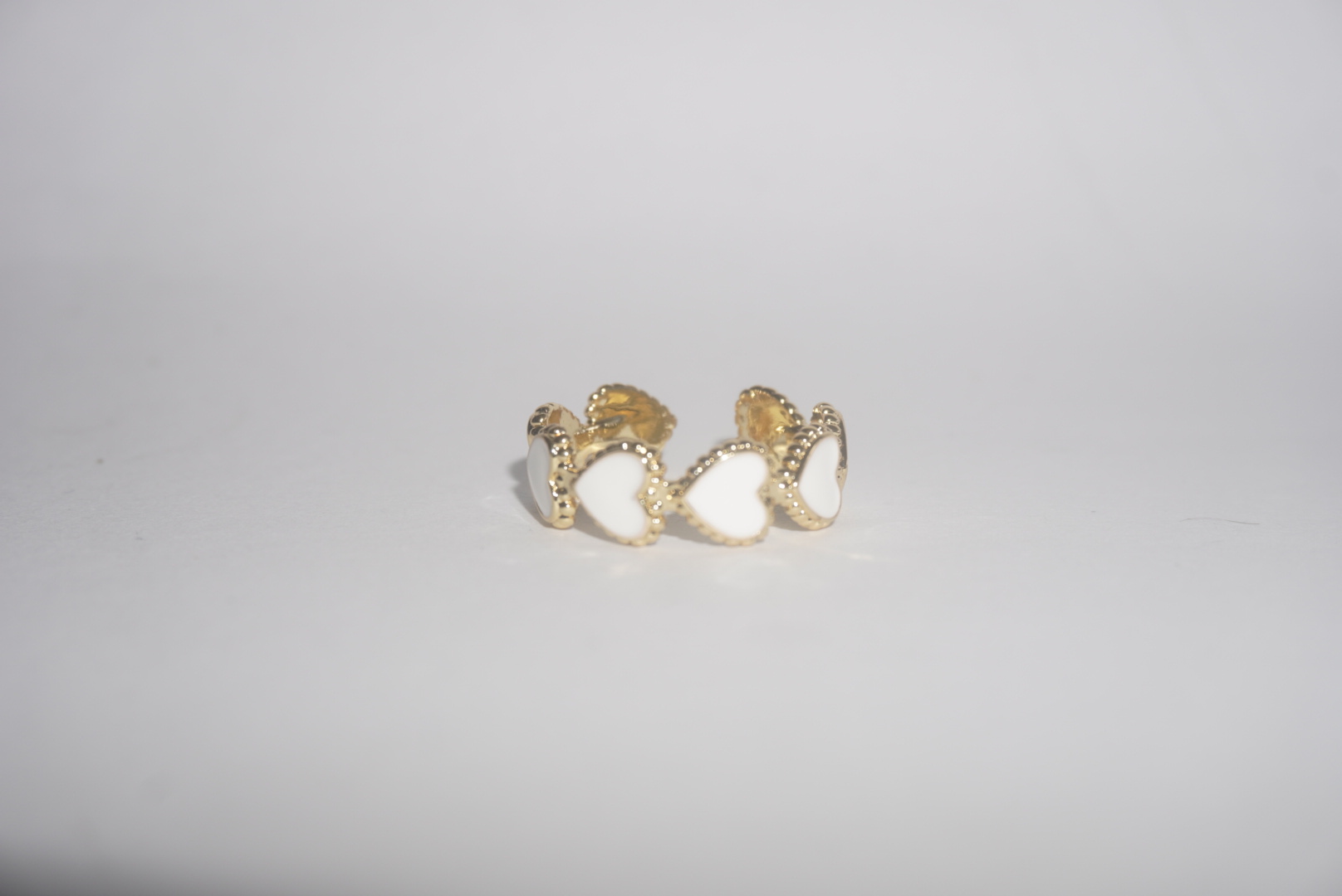 Anillo ajustable corazones blancos 