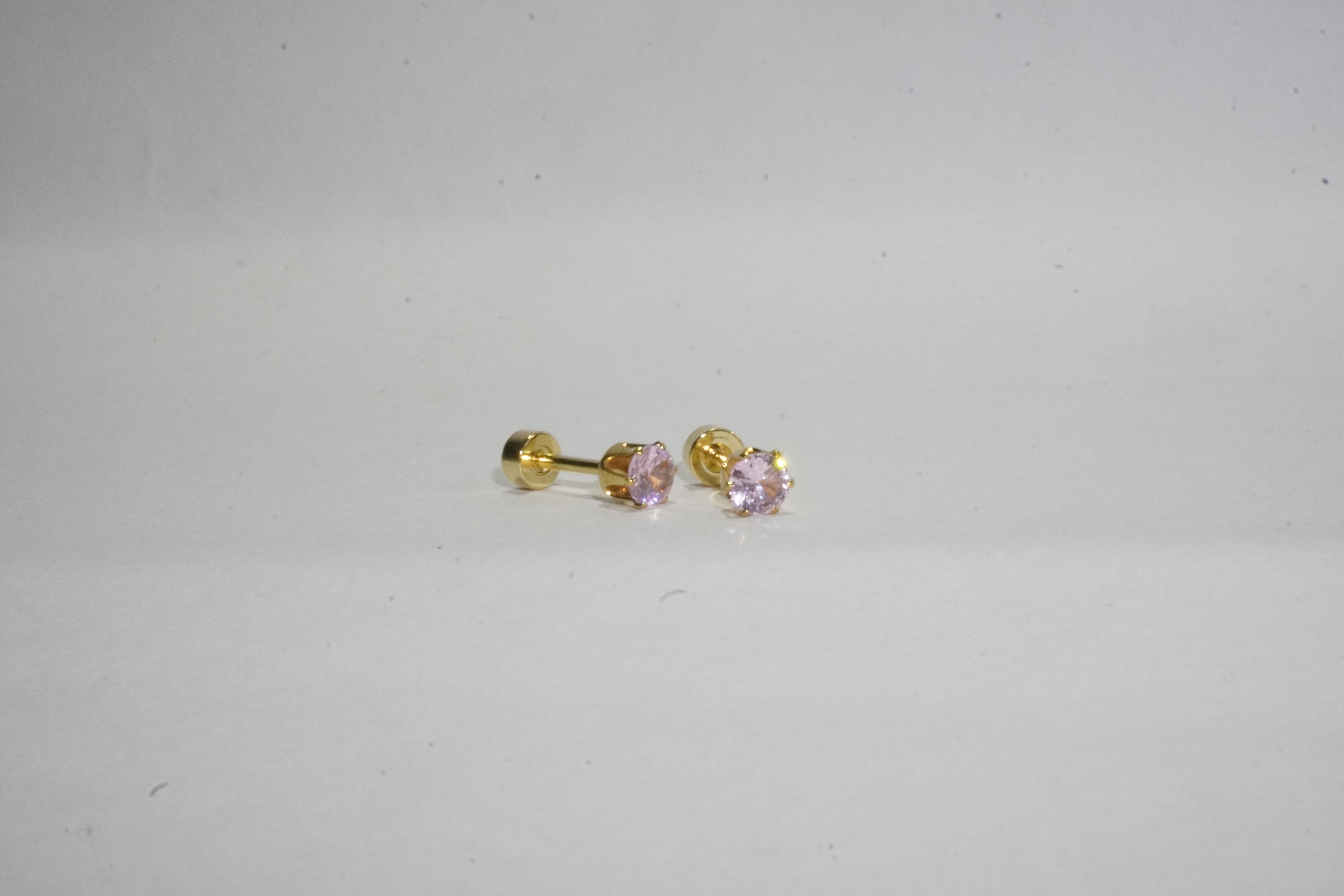 Broquele piedra rosada brillosa