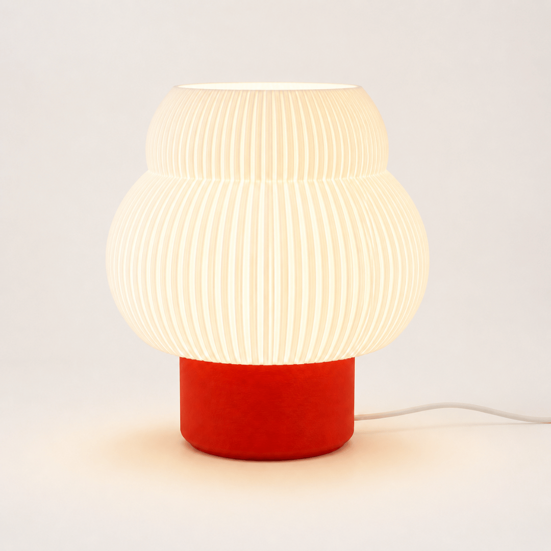 The Solara Ribbed Table Lamp in Warm Orange