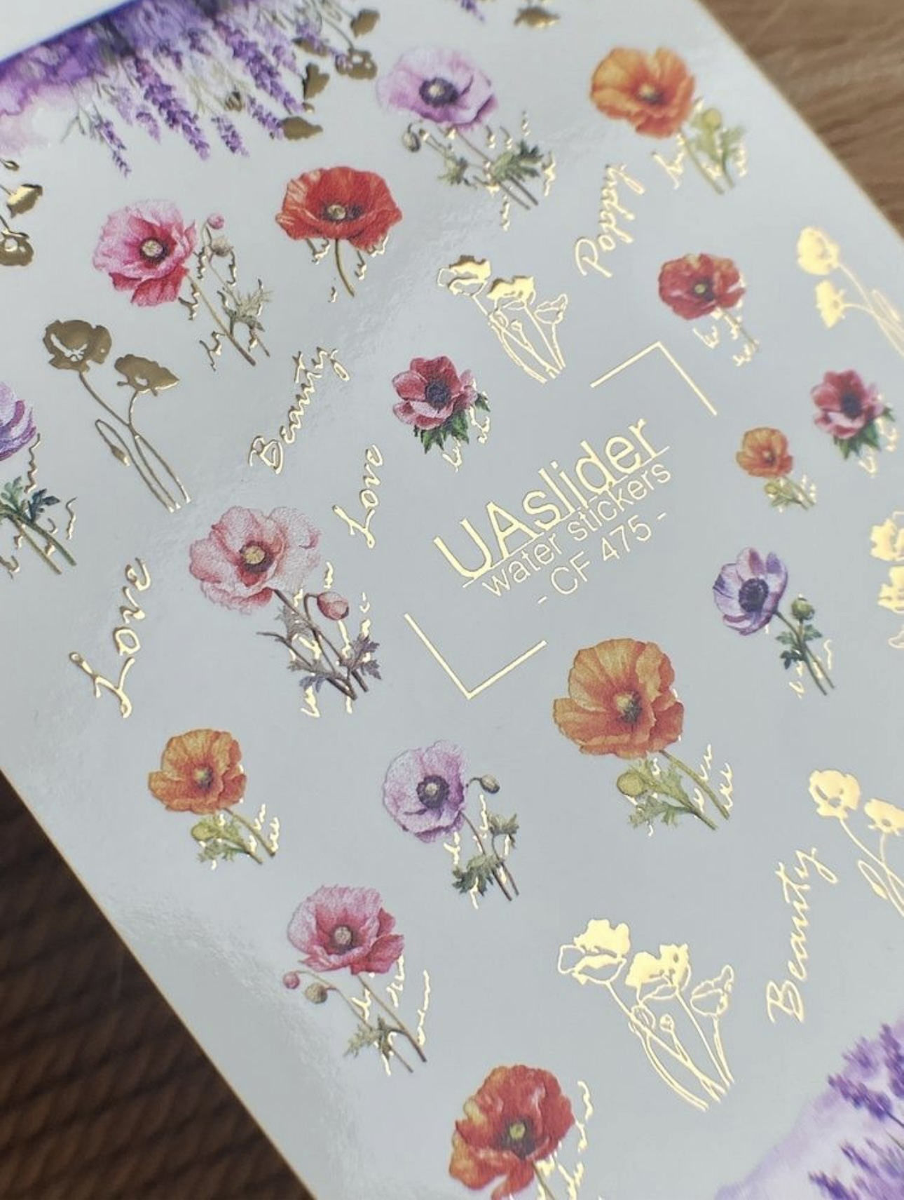 Nagų plėvelės su gėlių motyvais