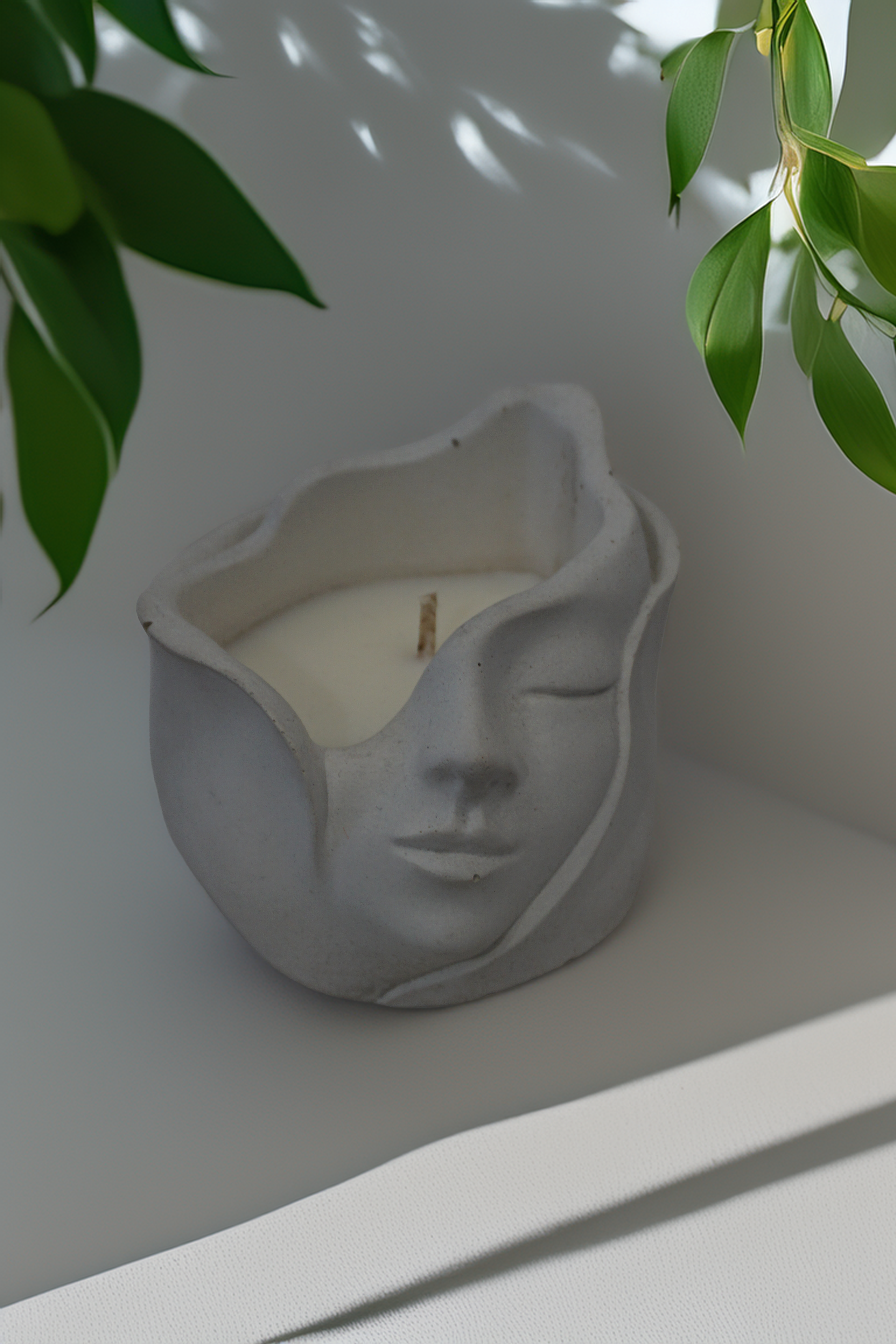 Betoninė žvakė "Veidas"