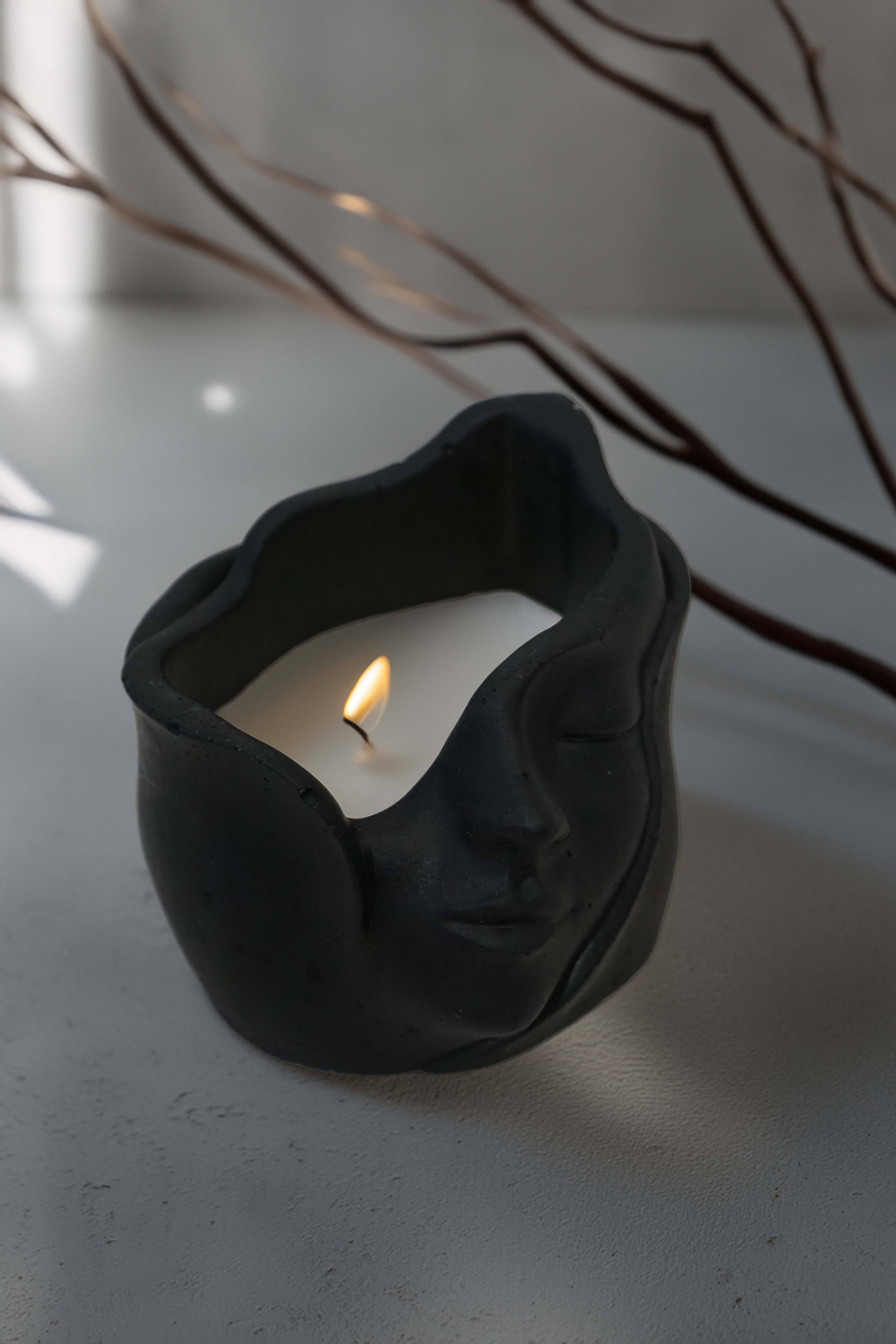 Betoninė žvakė "Veidas"