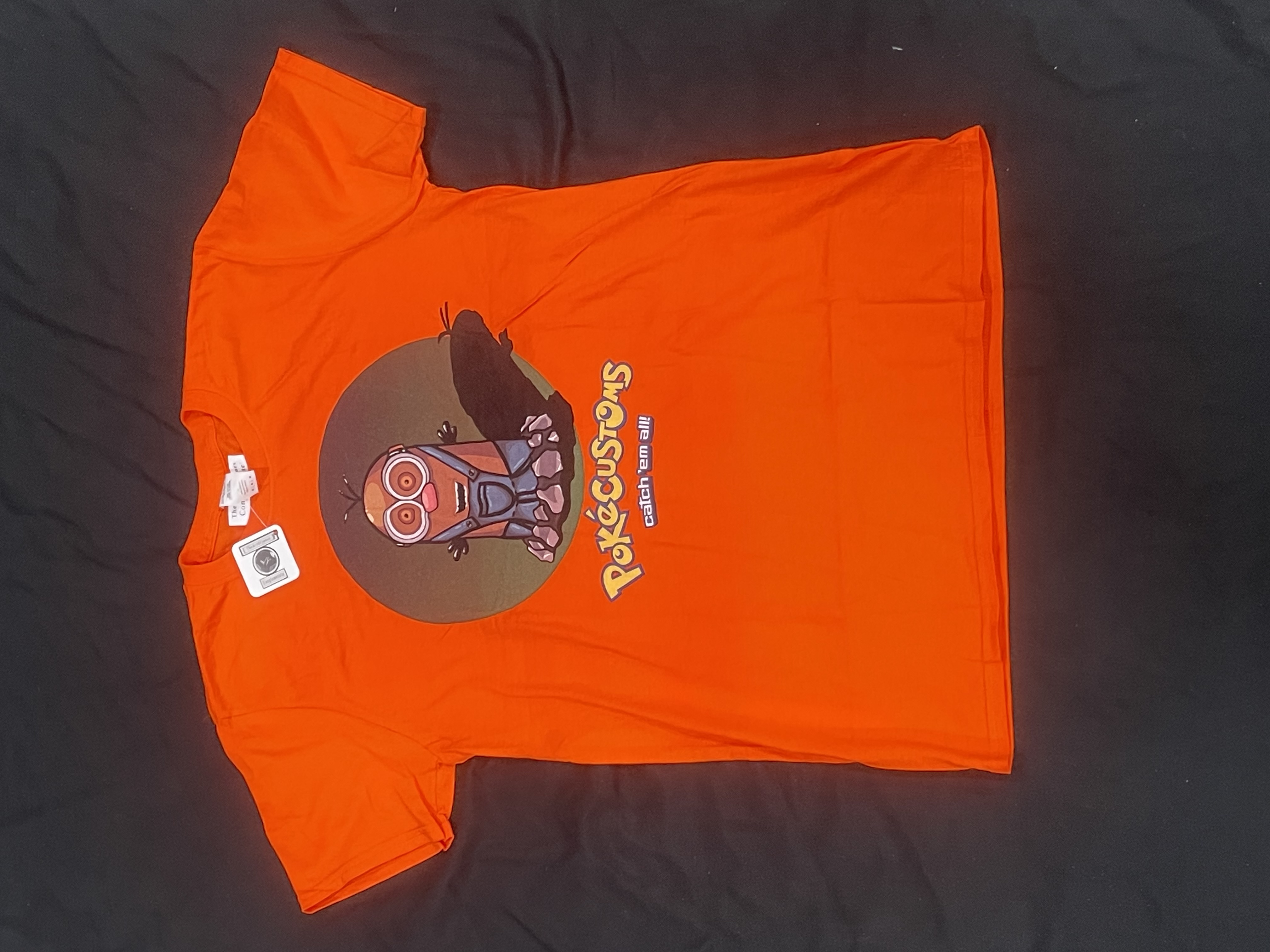 The Art Of Jones Conglomerate (T.A.O.J.C.) Graphic Tee