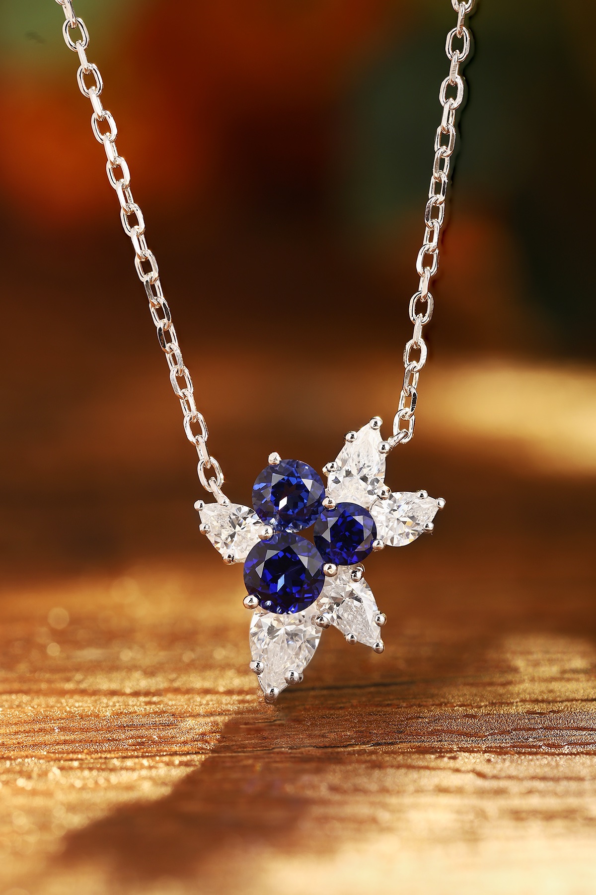 Blue gemstone flower pendant necklace