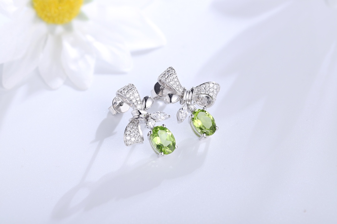 Elegant Bow-Shaped Earrings with Green Gemstones