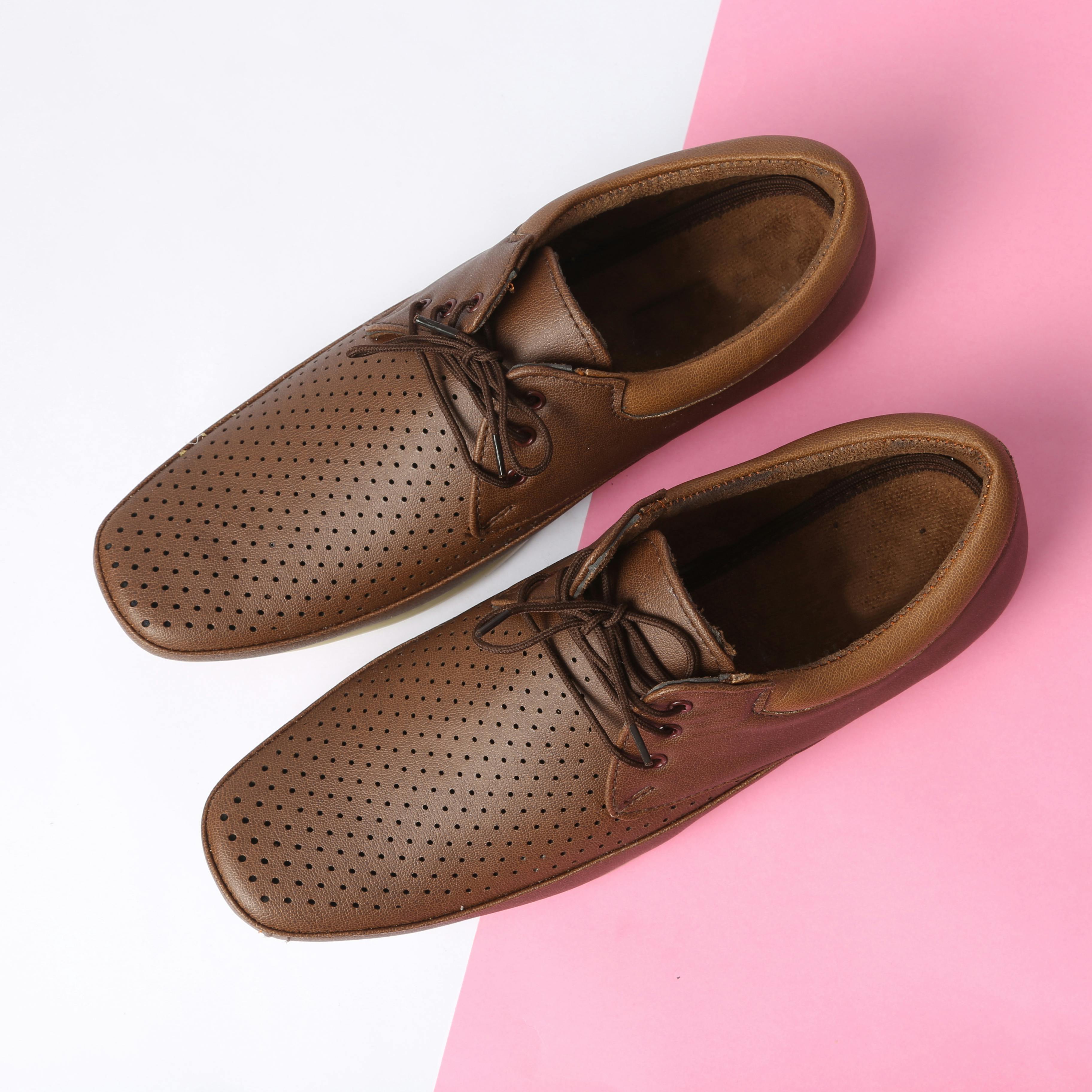 Brown perforated leather shoes