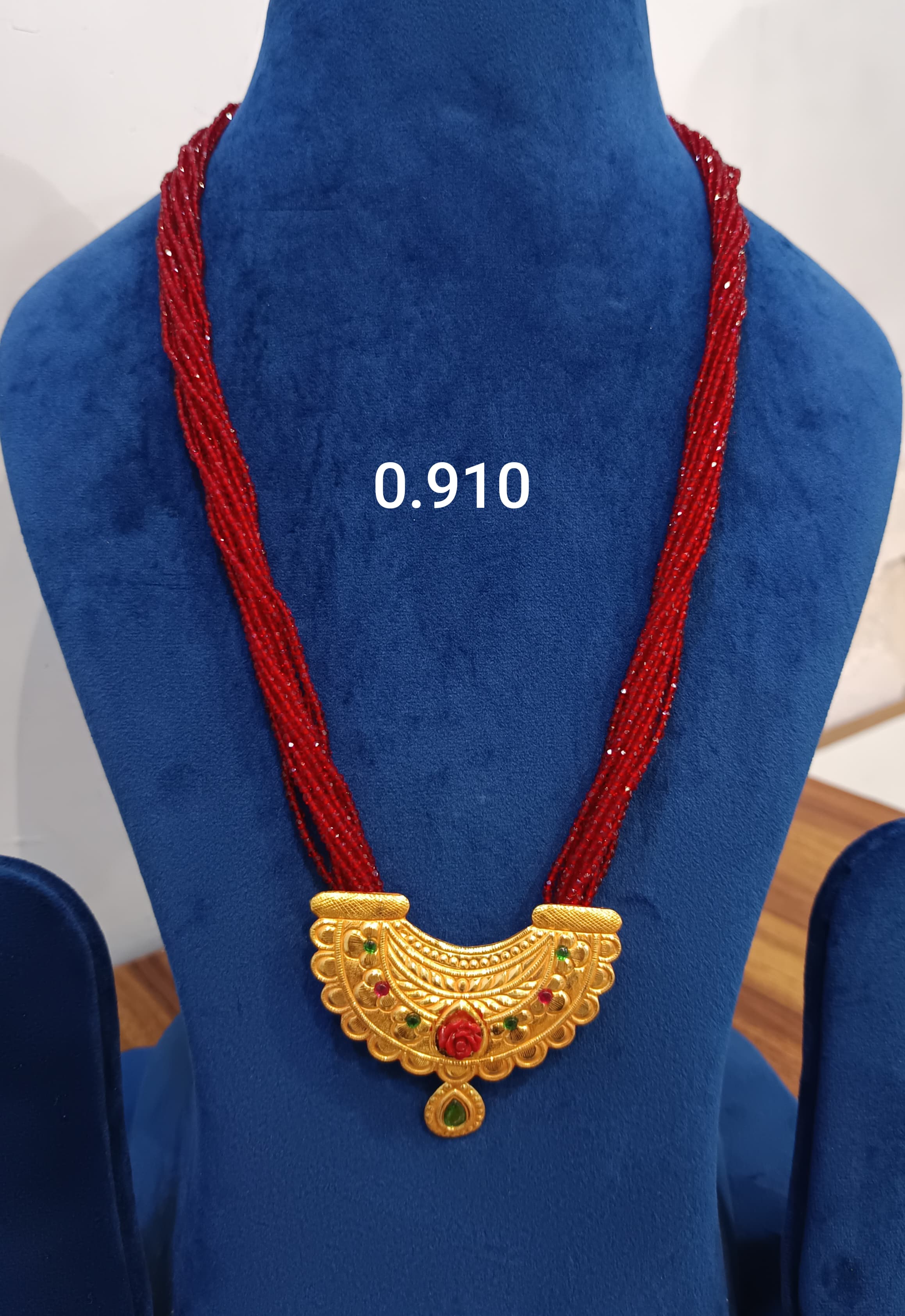 Traditional Red Beaded Necklace with Golden Pendant