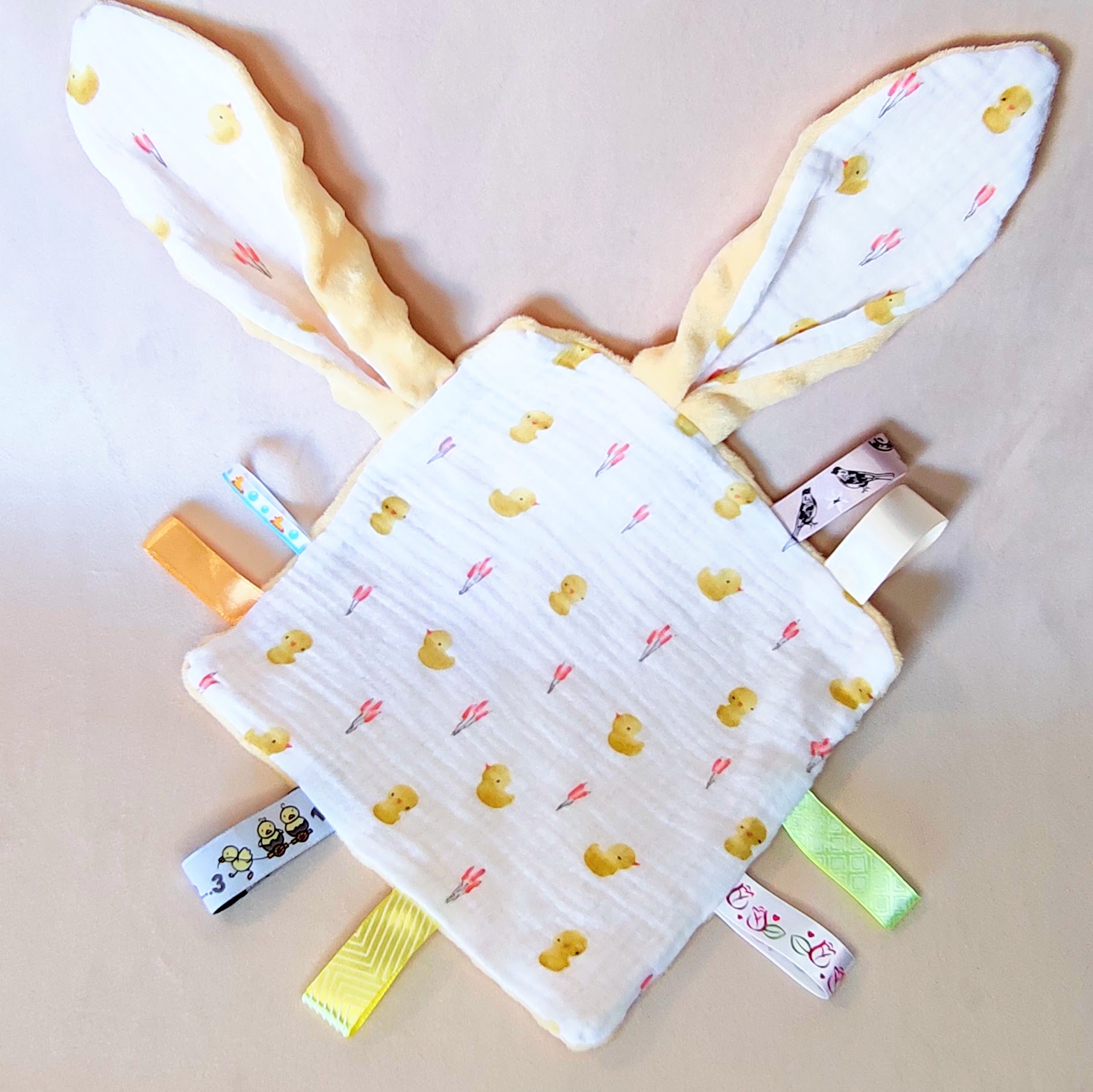 Doudou canard en tissu