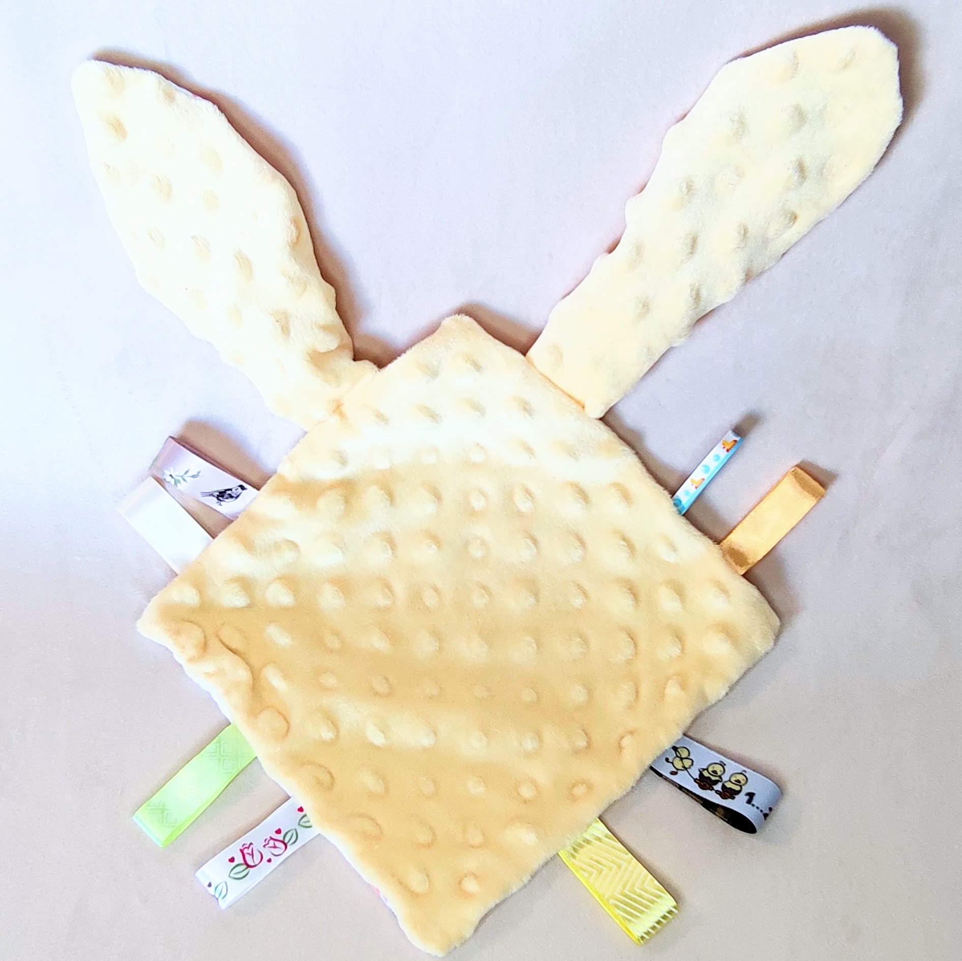 Doudou canard en tissu