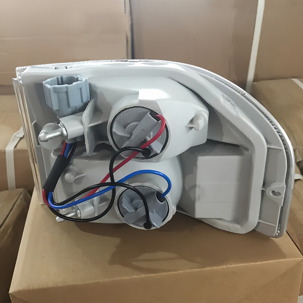 Nissan Civilian W41 2004-2012 model year cornering light assembly 215-15AA-U