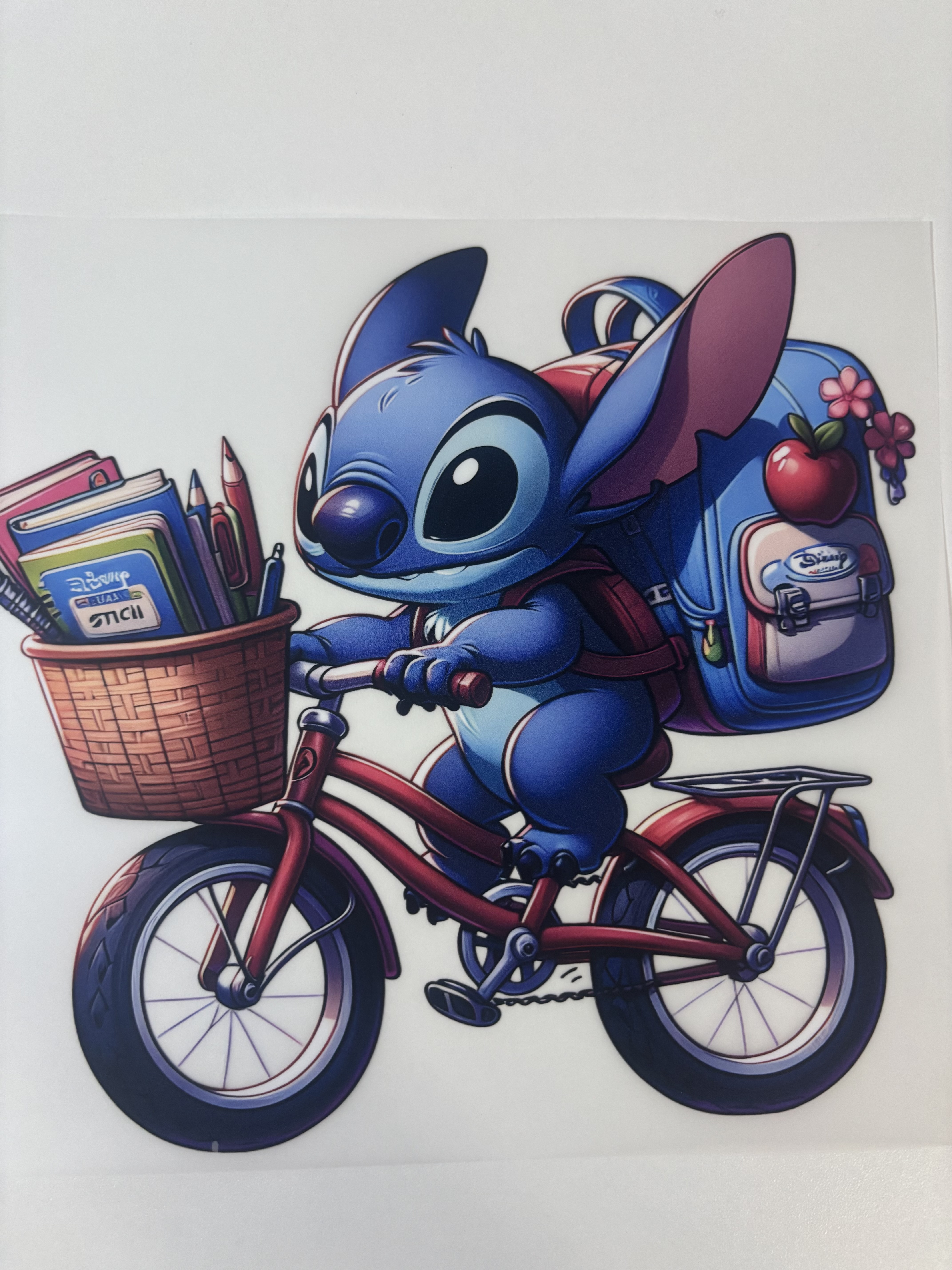 Stitch en bicicleta