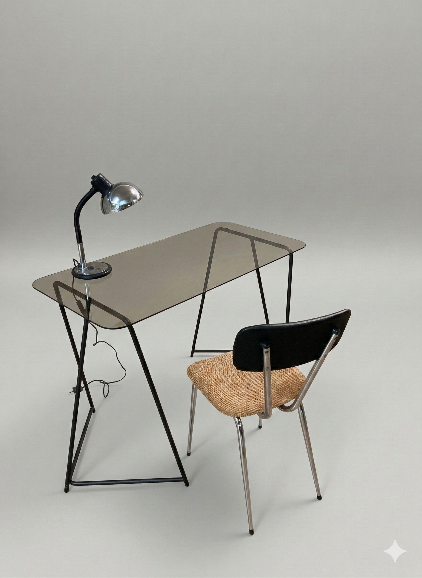 Bureau Yves Boutboul verre fumé et métal noir 
