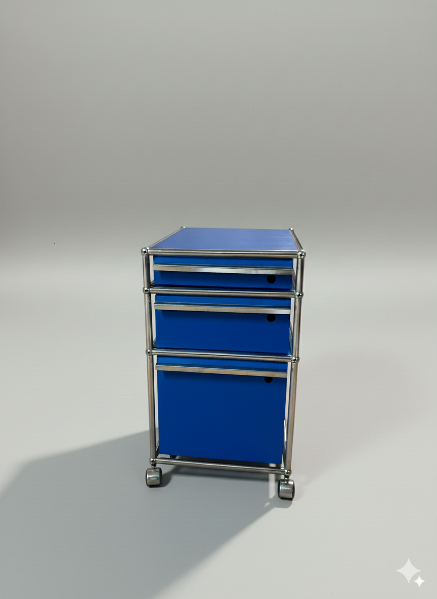 Caisson USM Haller M63 bleu mat – 3 tiroirs sur roulettes – design suisse