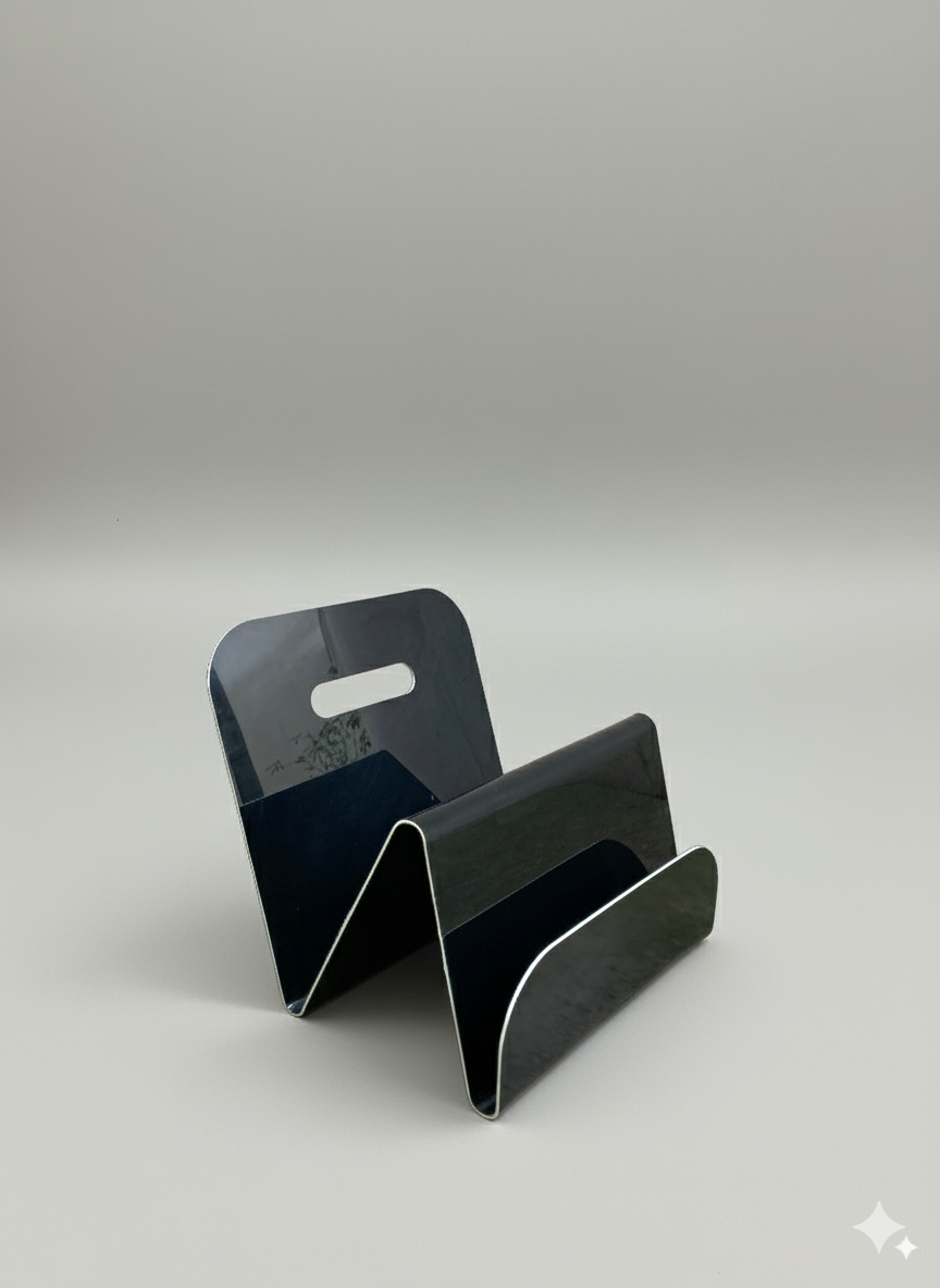 Porte-revues vintage ondulé noir plastique thermoformé – années 70