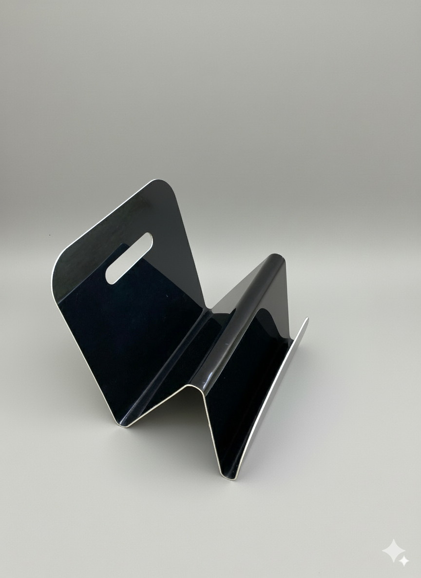 Porte-revues vintage ondulé noir plastique thermoformé – années 70