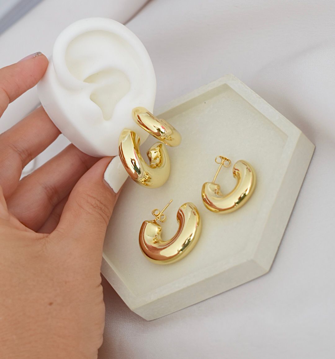 Aretes Aura