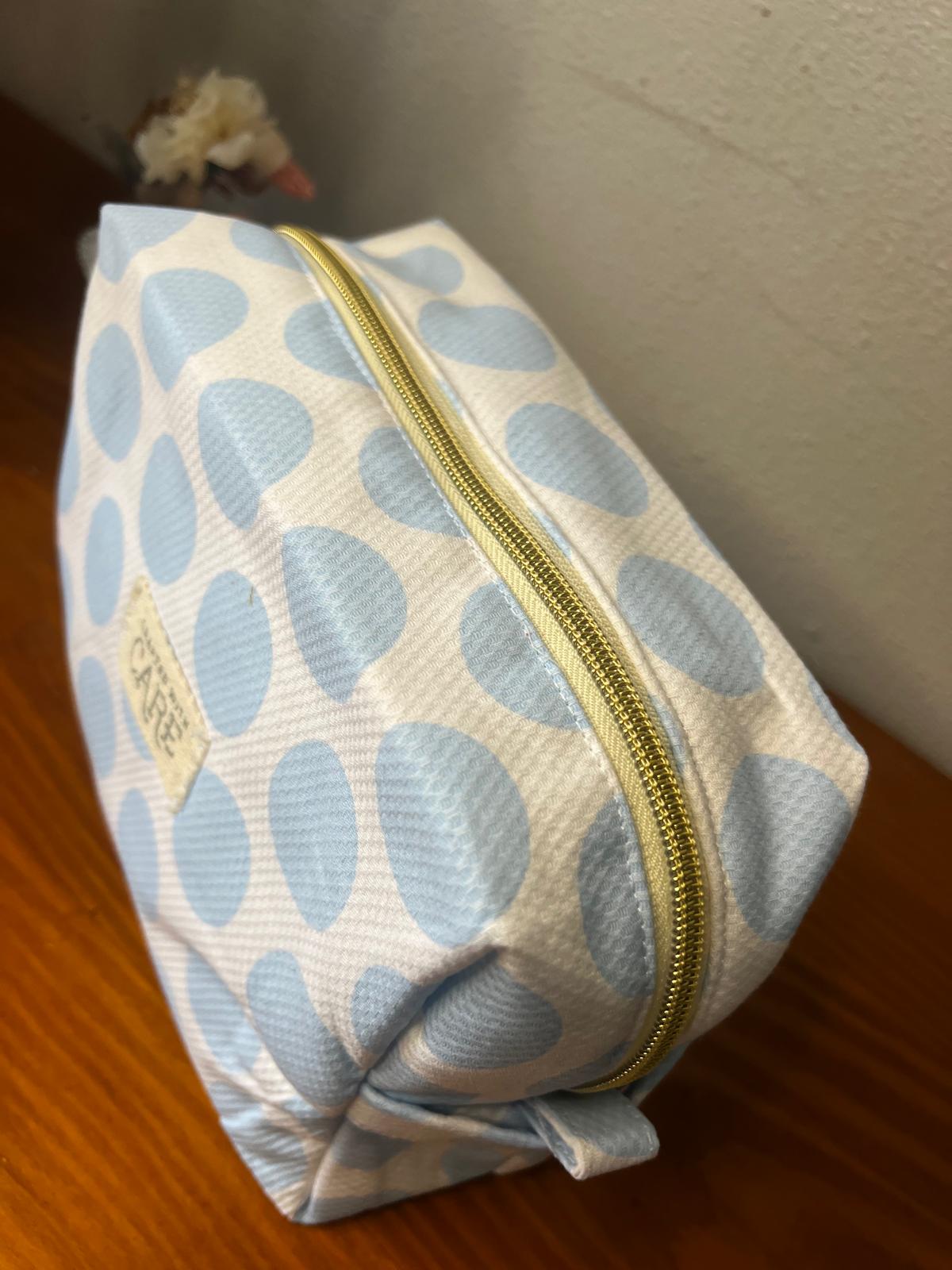 Trousse de maquillage à pois bleus