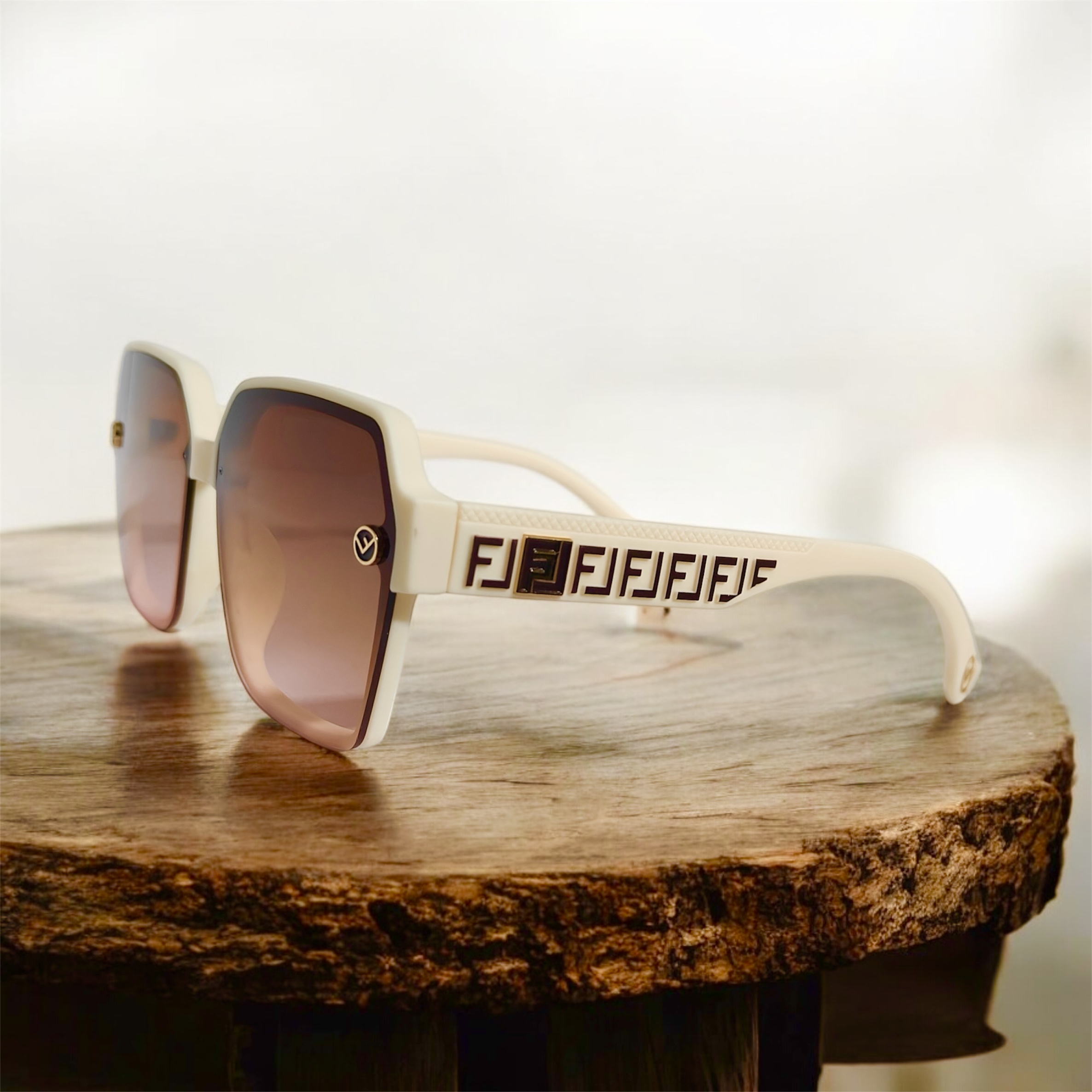 Stylish Off-White Sunglasses with Caramel Brown Tinted Lenses