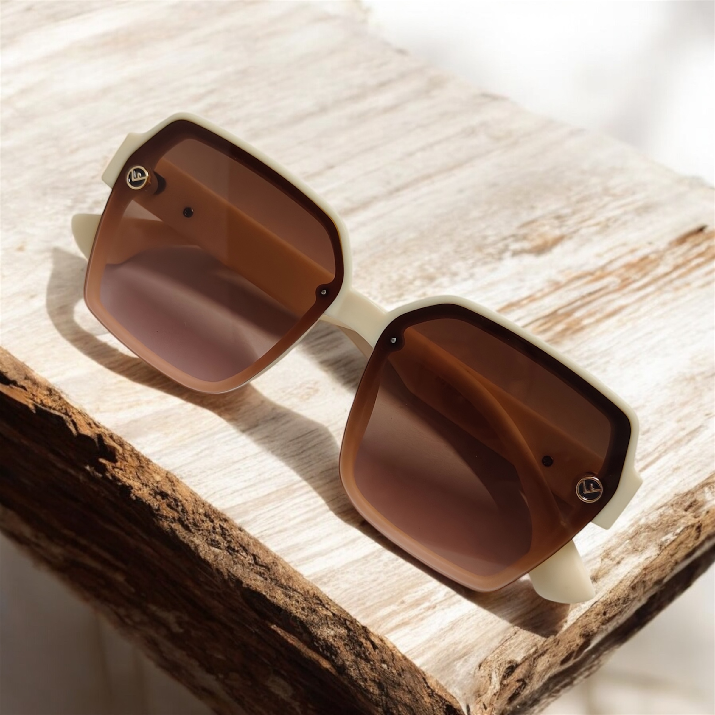 Stylish Off-White Sunglasses with Caramel Brown Tinted Lenses