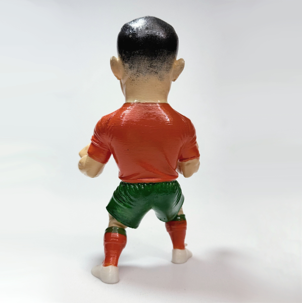 بُرتُقالِي فِجّاري لِلاعِب كُرة قَدَم