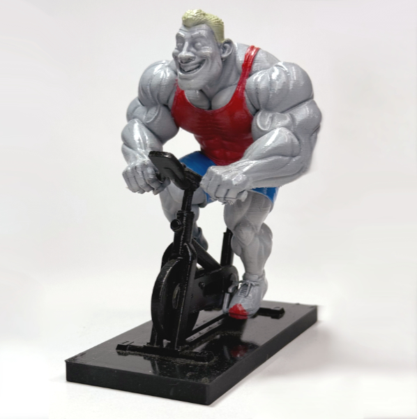 تمثال رياضي على دراجة ثابتة