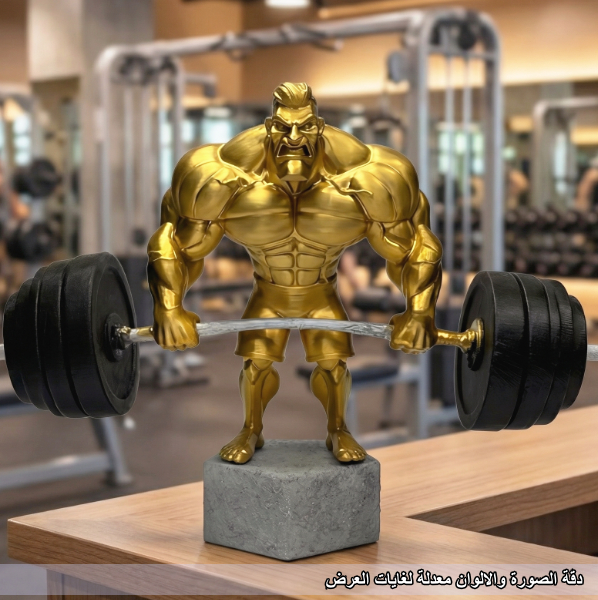 تمثال رفع الأثقال الذهبي