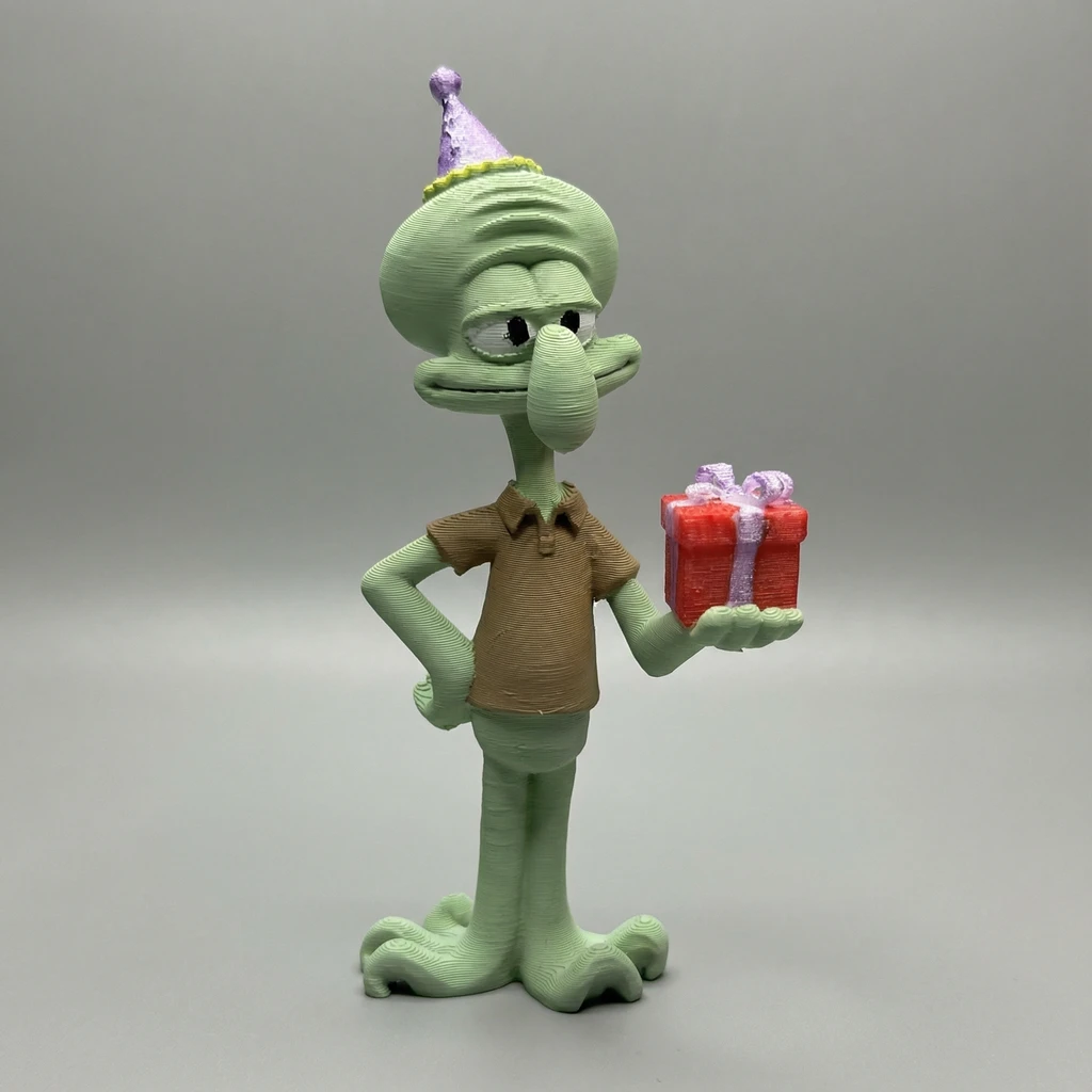 مجسم شفيق الحبار بقبعة الحفلات