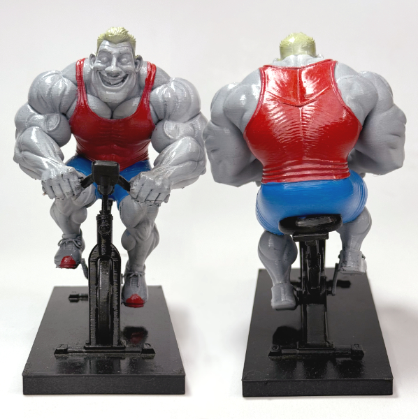 تمثال رياضي على دراجة ثابتة