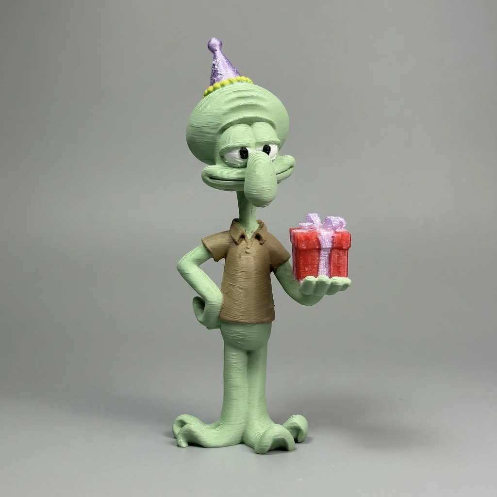 مجسم شفيق الحبار بقبعة الحفلات