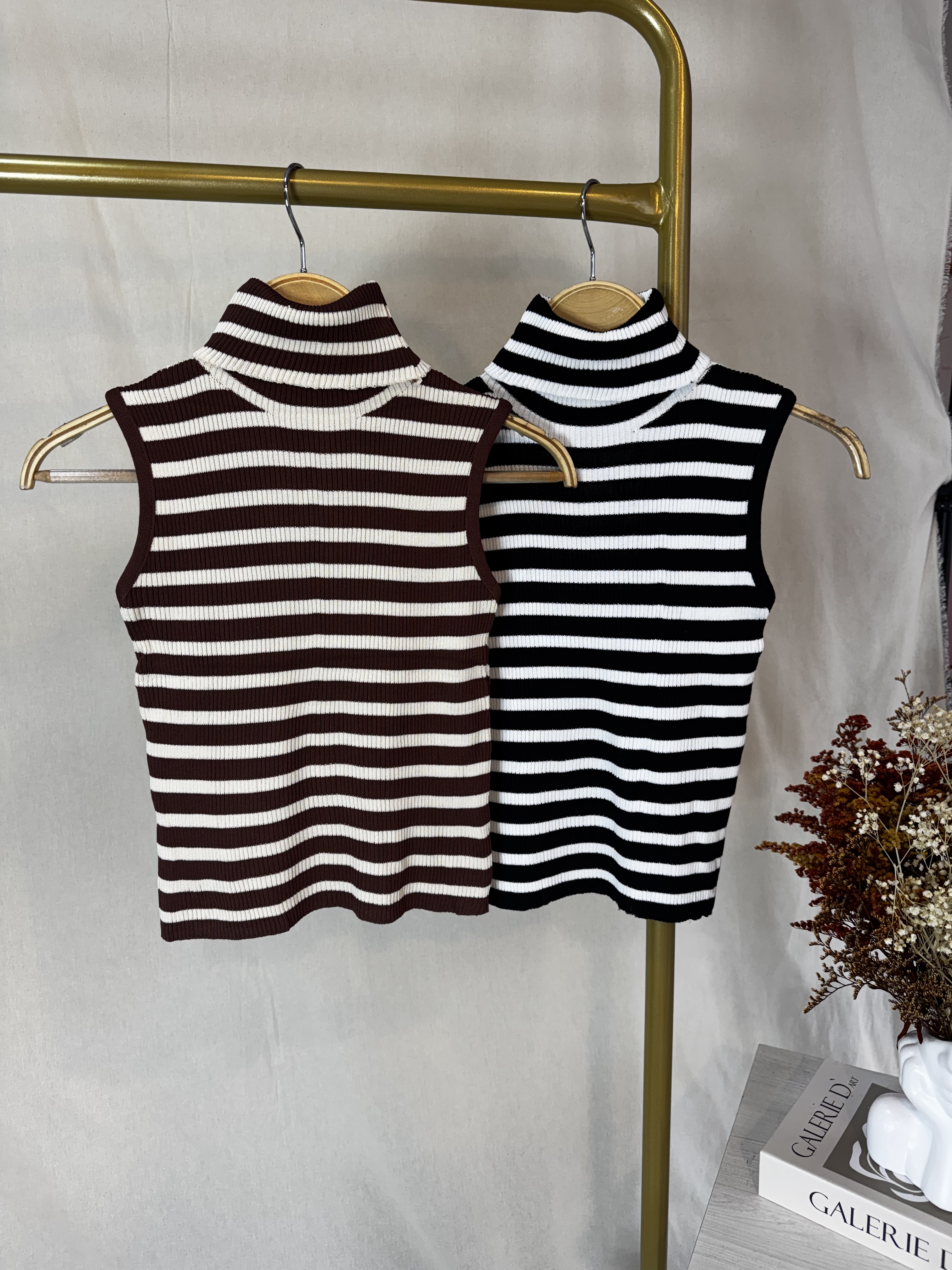 Suéter sin mangas de rayas