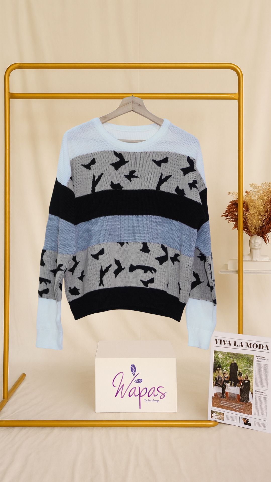 Suéter de rayas y aves
