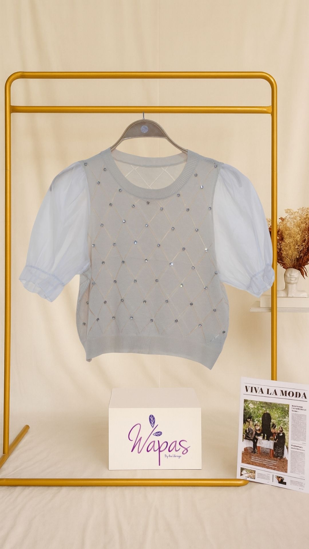 Suéter blanco con mangas abullonadas