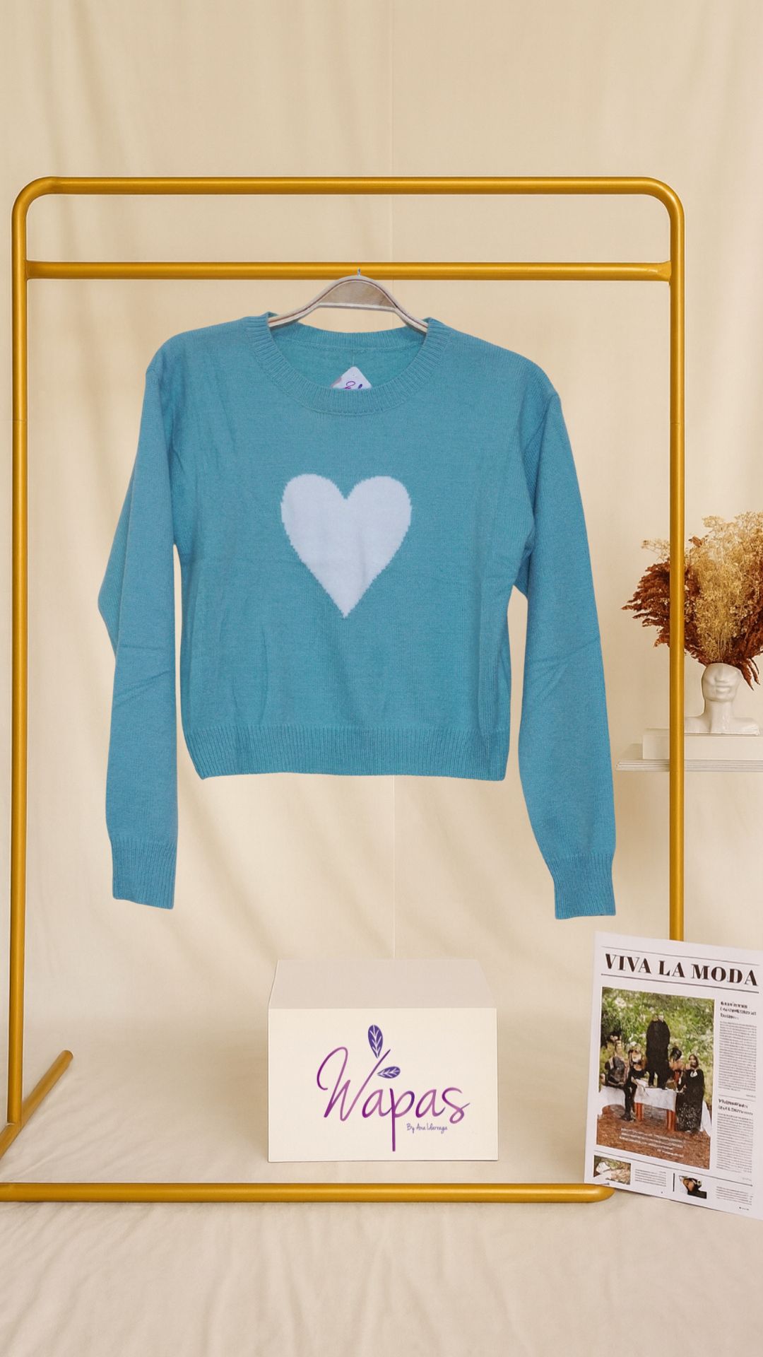 Suéter azul con corazón