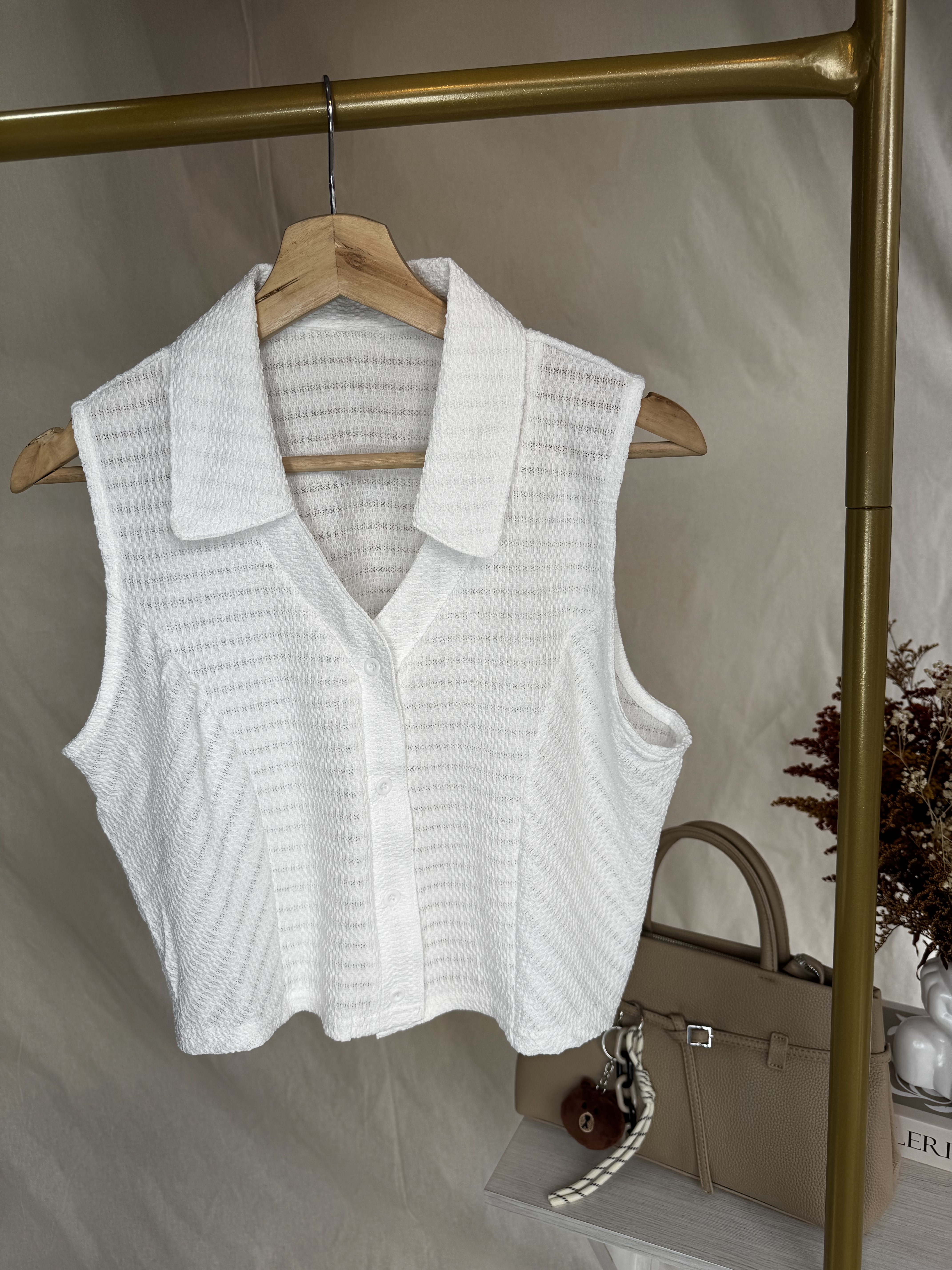 Chaleco blanco sin mangas