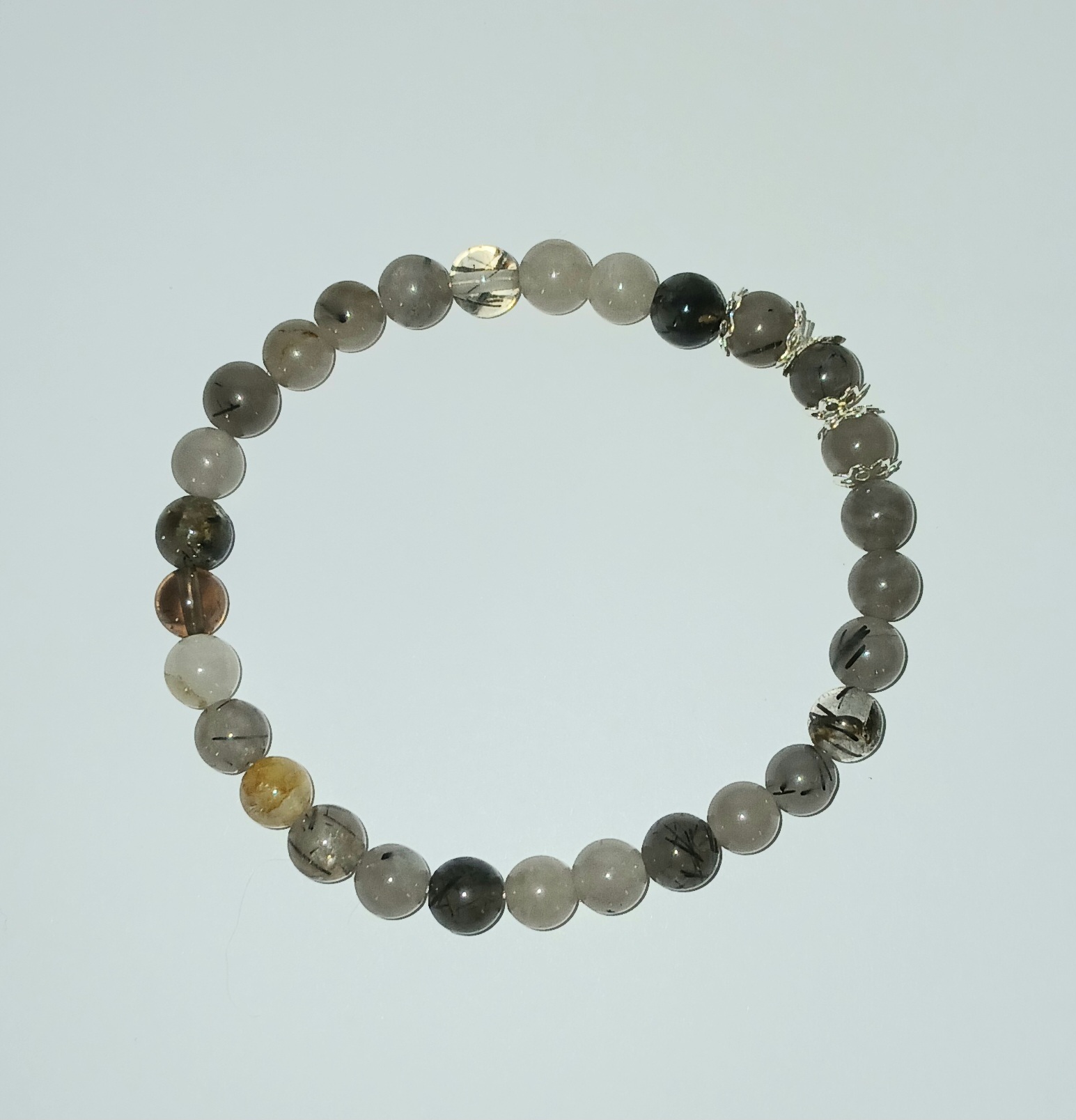 Kalnų krištolo su juoduoju turmalinu apyrankė