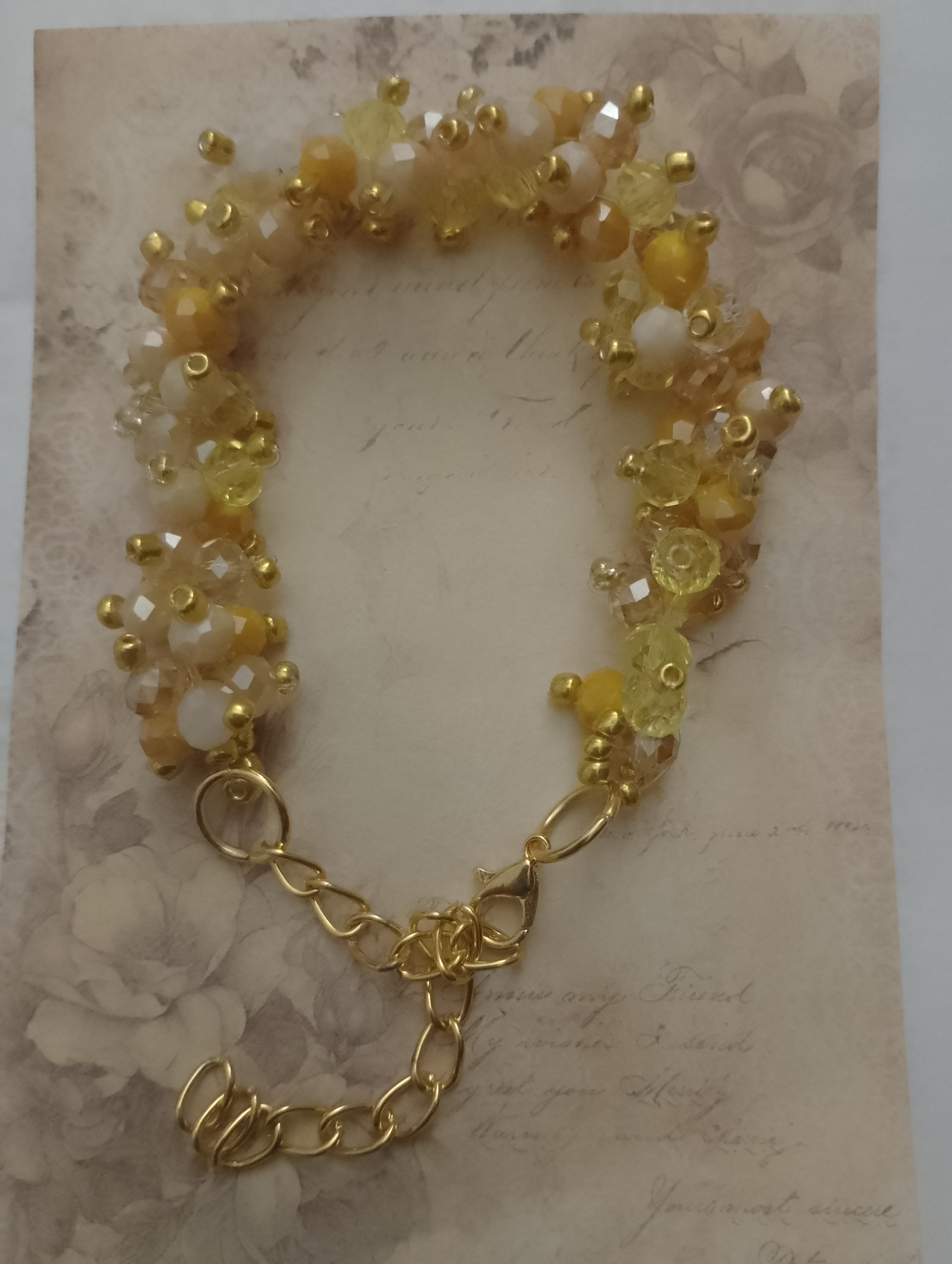 Pulsera de cuentas doradas y coloridas doble 