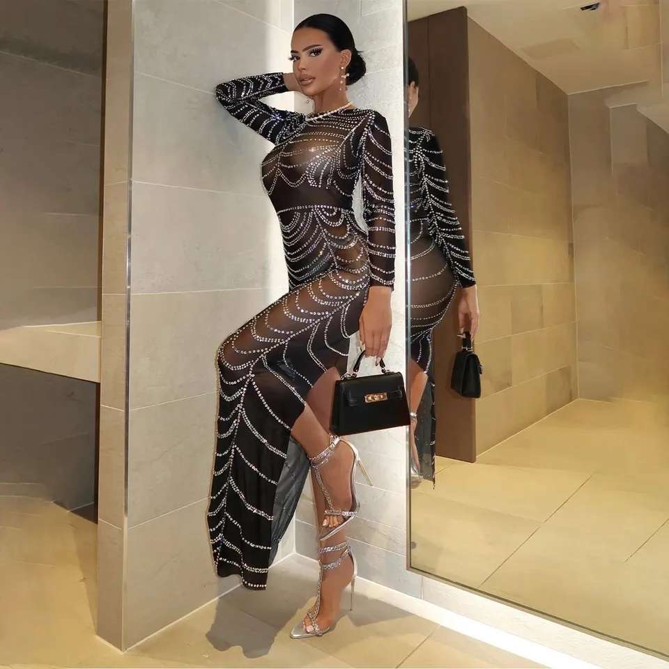 VESTIDO NEGRO TRANSPARENTE CON BRILLO